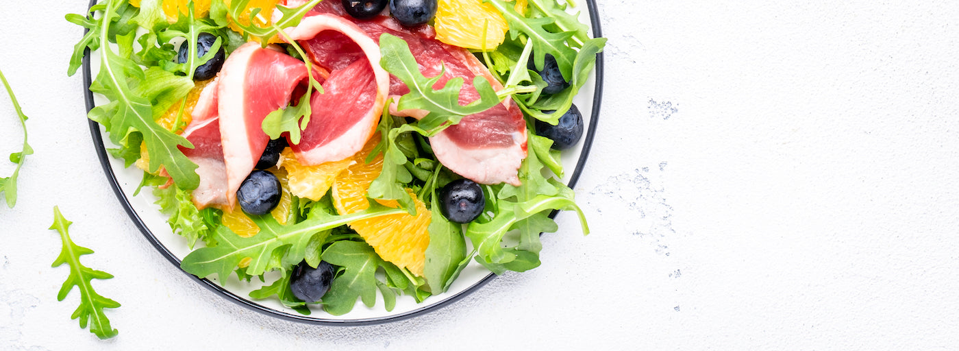 https://bellabellagourmet.com/cdn/shop/files/gourmet-salad-with-smoked-duck-oranges-blueberri-2023-02-11-00-51-36-utc_1600x.jpg?v=1676664508